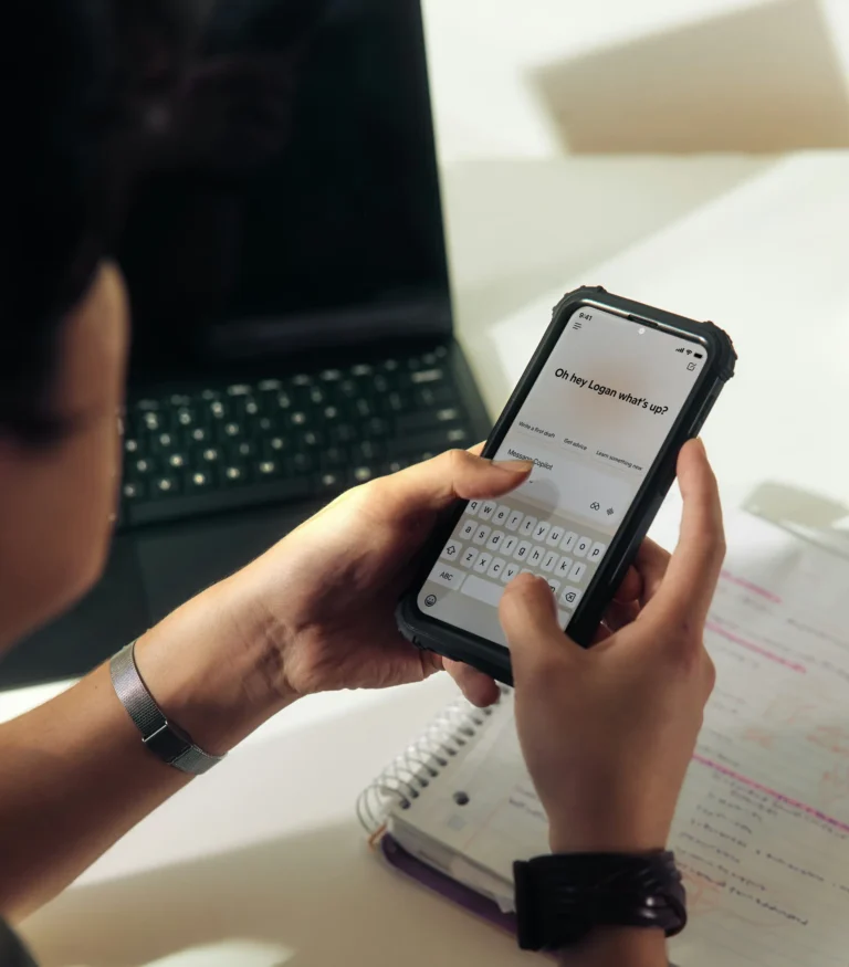 Student on phone using Microsoft Copilot
